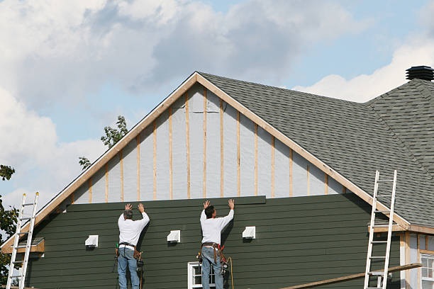 Professional Siding technician working in Baden, MD